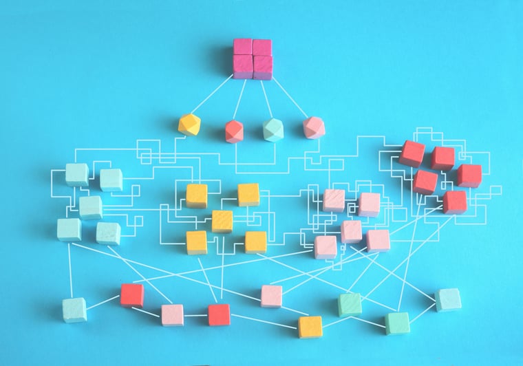 Illustration of disjointed and mismatched 3D blocks, symbolizing the complexity and fragmentation in legacy ICM platforms.